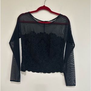 Vintage black sheet JS boutique long sleeve embellished back zip blouse.